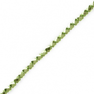 Perline sfaccettate verde chiaro metallico