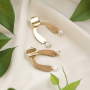 Idee creative per orecchini con ciondoli e distanziatori in oro e argento