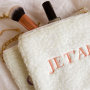 Pochette teddy compatte ed essenziali