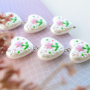 Crea gioielli accattivanti con perle di imitazione dipinte a mano