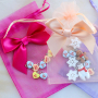 Crea regali unici con sacchetti di organza e ornamenti decorativi