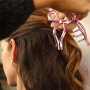 Ecco come abbinare le nostre pinze per capelli festose
