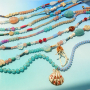 Crea collane colorate con perline tonde