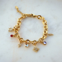 Realizza collane e bracciali eleganti con ciondoli e distanziatori in ottone TQ